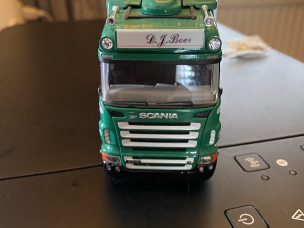 Scania R highline met wipkar Reefercombinatie